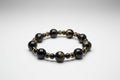 12mm_and_6mm_Black Golden Wire Agate Beads
on a laptop keyboard