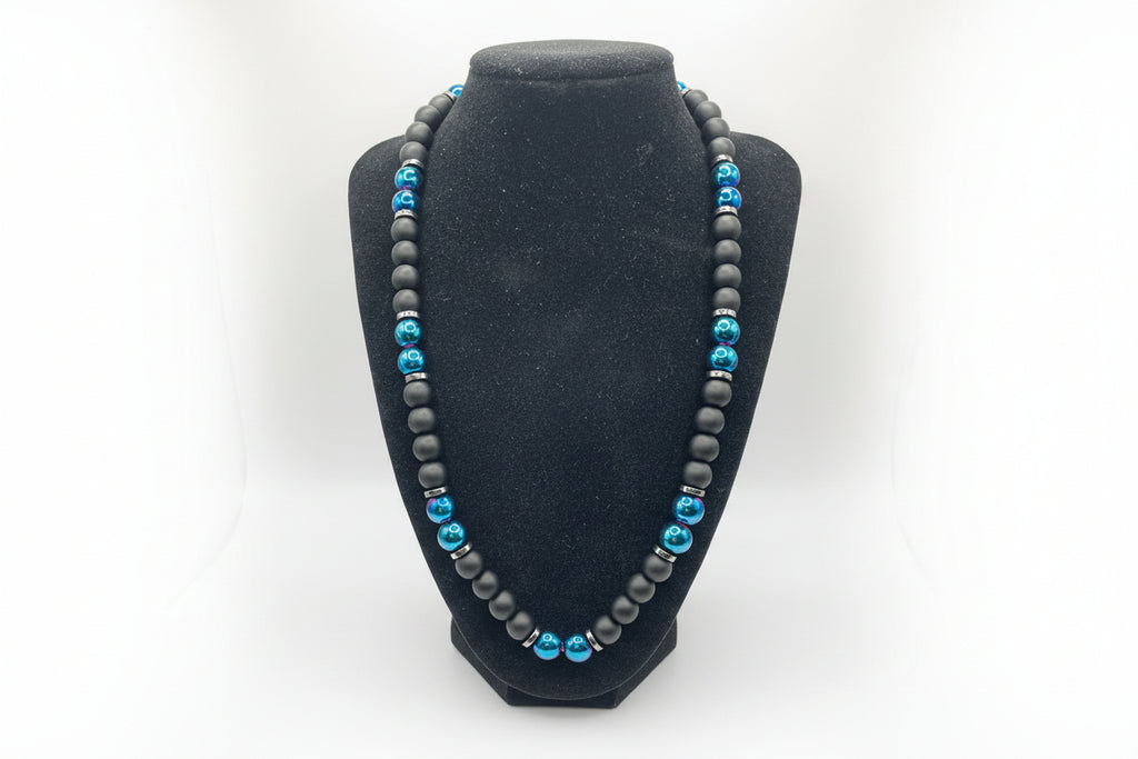 Black stand with blue & matte beads trim on a white background