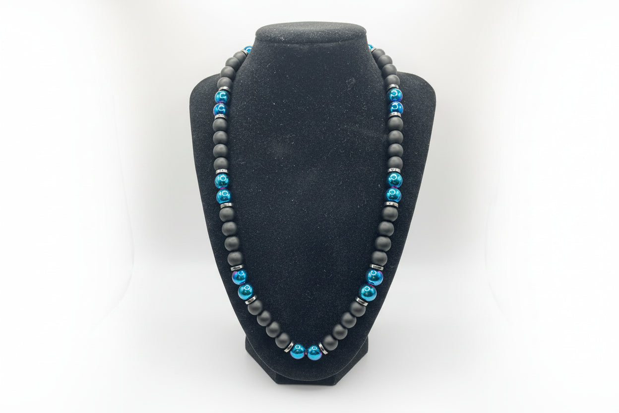 Black stand with blue & matte beads trim on a white background