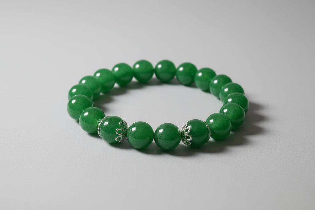Green beaded bracelet on a wooden surface
