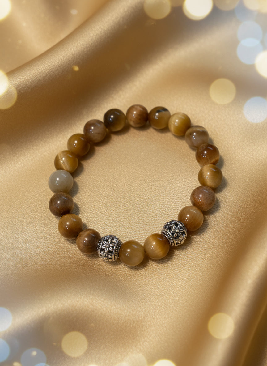 Raw Gemstones Tiger Eye bracelet with silver spacer and golden color. 