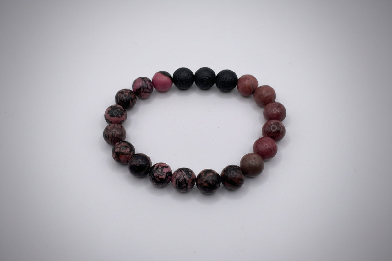 Bracelet with dark and reddish-brown beads on a white background