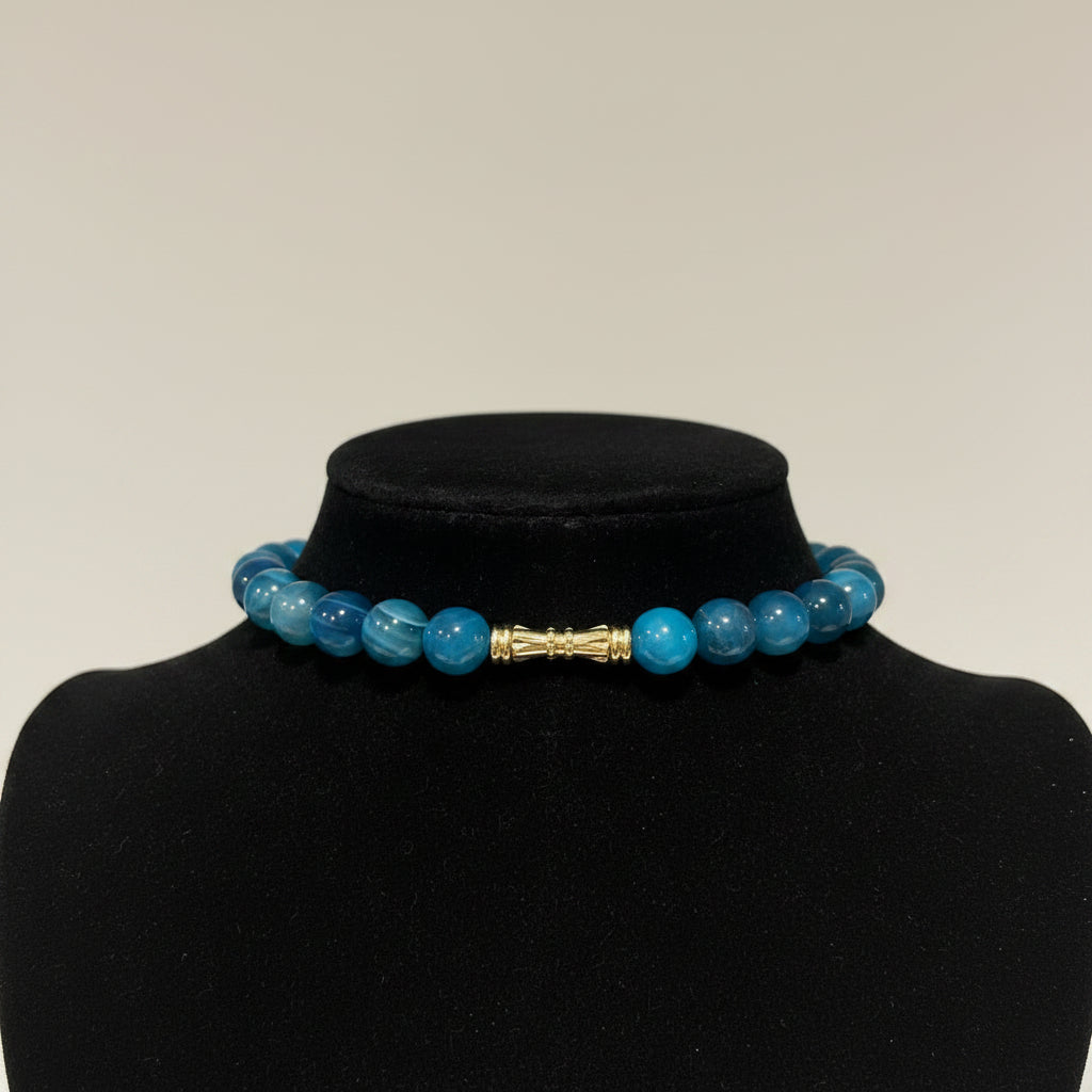 Blue beaded Back of necklace with gold accent closure
