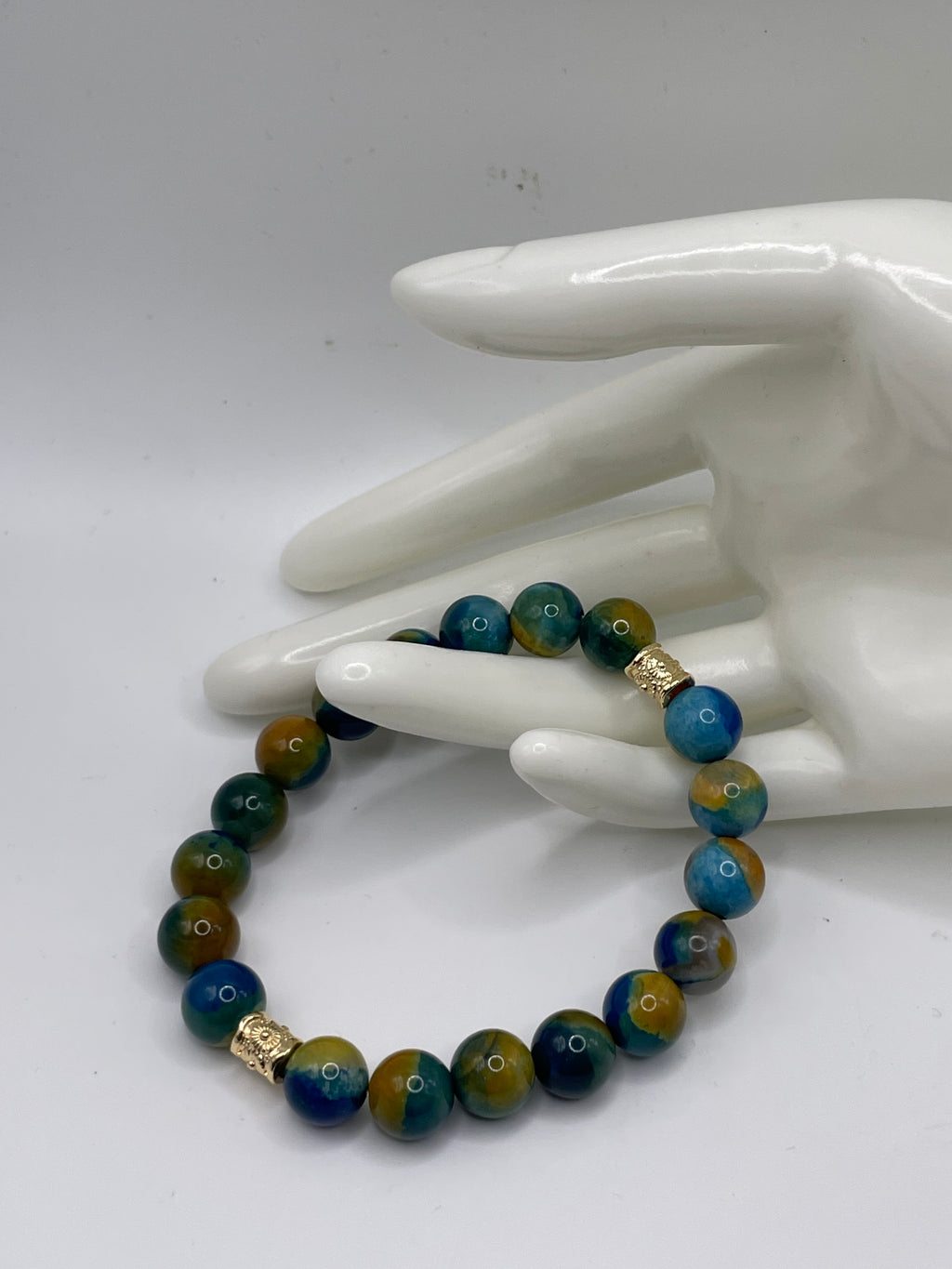 Blue and Yellow Agate Bead Bracelet 10mm on hand display