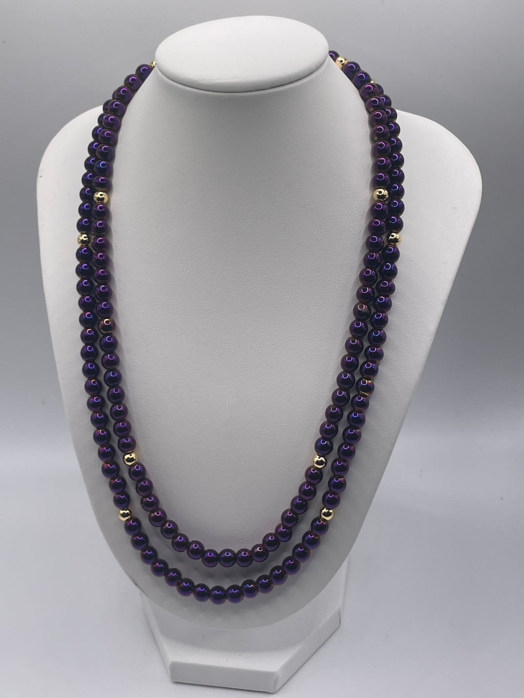 Purple Hematite 6mm double chain necklace with gold beads on necklace bust display, front view