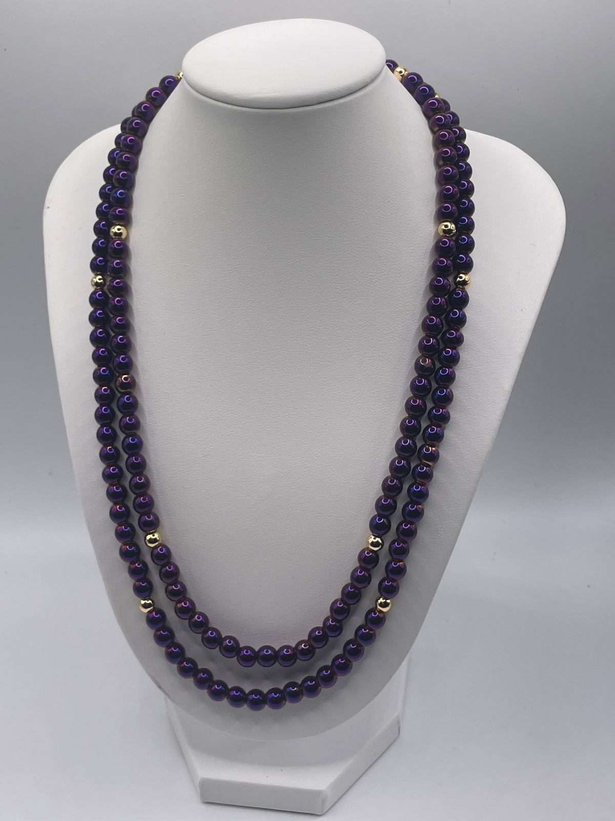 Purple Hematite 6mm double chain necklace with gold beads on necklace bust display, front view