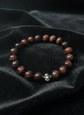 Red Tiger Eye with Silver spacer Size 7- 7 1/2 fits comfortable. 