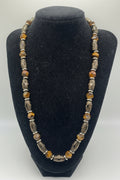 Tiger Eye Faceted and Bohemian Acrylic Oval Bead Necklace on black bust display