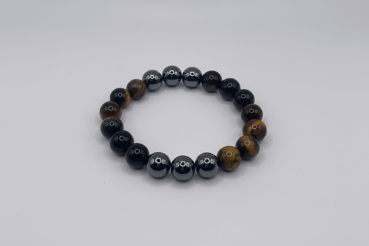 Black and brown beaded bracelet on a white background
