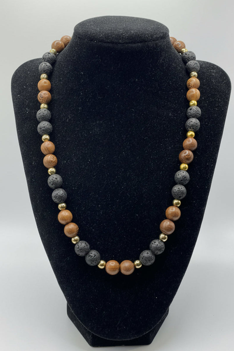 Necklace with multicolored beads on a black stand